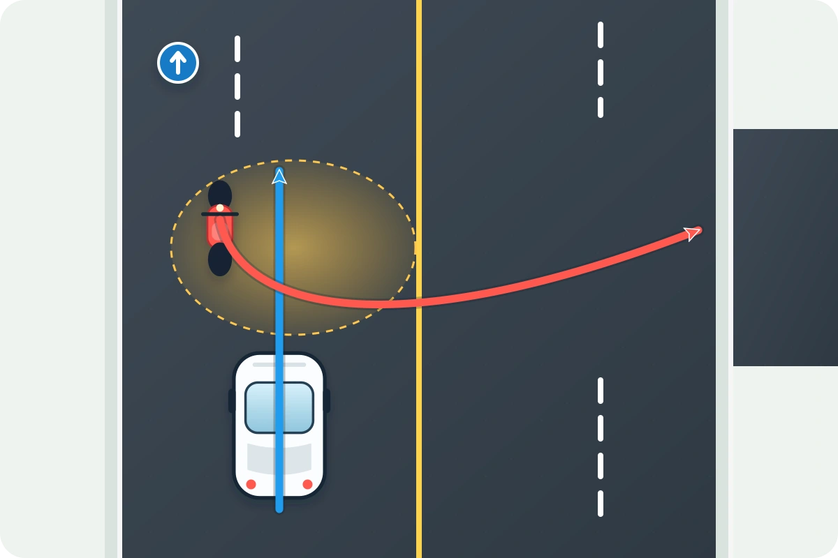A scooter turning across the lane on a road in Thailand
